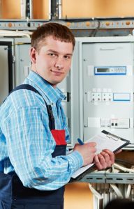 One electrician working with distribution fuseboard